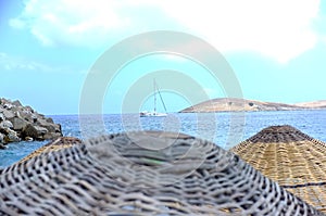Wicker parasols and sea view