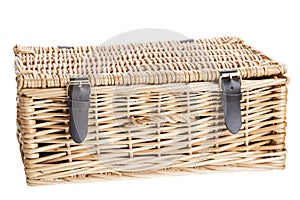 Wicker picnic basket with leather brass buckled straps.