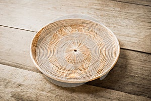 Wicker placemat on wooden table