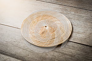 Wicker placemat on wooden table