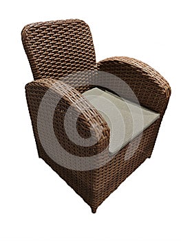 Wicker rattan armchair with armrests in minimalist style on isolated white background, studio shot, side view