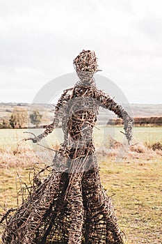 Wicker witch in the field at the Rollright Stones, Oxfordshire