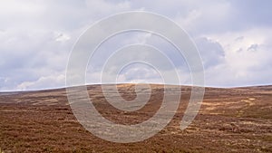 Wicklow mountains with plateau with brown peatland on a hazy day