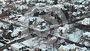 Wide aerial view of a Naperville city covered with snow in winter time, american city with a private sector