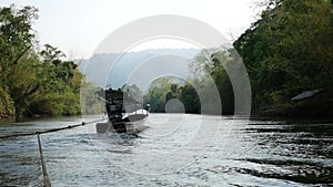 Wide angle footage of boating and rafting trip along River Kwai