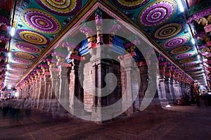 Wide angle from inside the meenakshi temple in madurai india, with colorful ceiling and columns