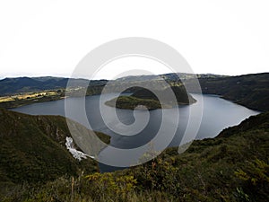 Wide angle panorama of Cuicocha caldera crater lake Cotacachi volcano Otavalo Andes mountains Imbabura Ecuador
