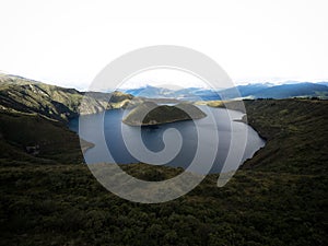 Wide angle panorama of Cuicocha caldera crater lake Cotacachi volcano Otavalo Andes mountains Imbabura Ecuador