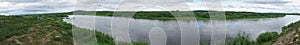 Wide-angle panorama of a river in Swedish Lapland