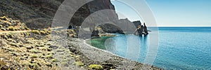 Wide angle panorama. Roque de Bonanza is one of the symbols of El Hierro island and its natives. Huge Rock sticking out of the