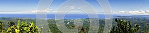 Wide Angle Panoramic Landscape View of Baracoa Bay and Atlantic Ocean Coastline from summit of El Yunque Mountain Cuba