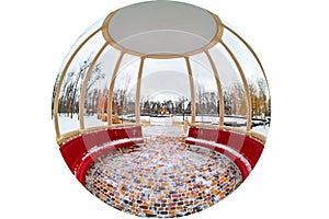 Wide-angle panoramic circular view from a gazebo with yellow columns and a red bench