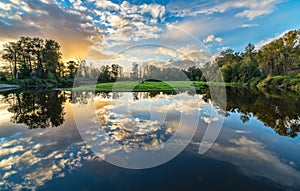 Wide Angle River Clouds Reflection