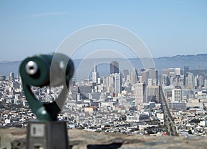 Wide angle shot of binoculars looking at the city of San Francisco