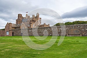 Wide angle shot of Castle of Mey in Caithness, Scotland with a manicured lawn