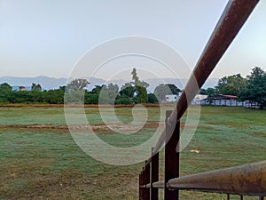 A wide angle shot of an empty playground taken from stands during corona pandemic. Dehradun City Uttarakhand India