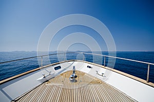 Wide angle shot of front of the yacht in summer time