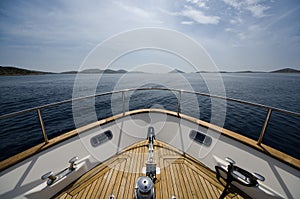 Wide angle shot of front of the yacht in summer time