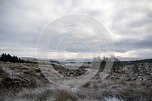 Wide angle shot of frost covered valley on a winter morning near Falstone