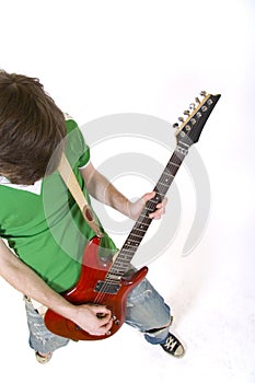 Wide angle shot of a Guitarist playing guitar