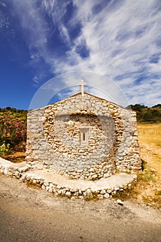 A wide angle shot of a small church on Zakynthos island
