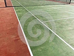 wide angle tennis court green lines red clay playing score bounds sports park