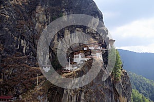 Wide angle view of cliffside showing steps leading to Paro Taktsang or Tiger`s Nest Buddhist Monastery, upper Paro valley, Bhutan