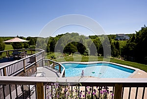 Wide angle view of deck and swimming pool