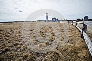 Wide angle view of the Highland Lighthouse on Cape Cod on a spring day