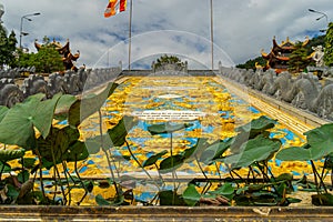 Wide angle view of Ho Quoc pagoda (Vietnamese name is Truc Lam Thien Vien) with big statue of guanyin bodhisattva on mount, Phu