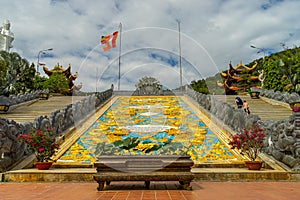 Wide angle view of Ho Quoc pagoda (Vietnamese name is Truc Lam Thien Vien) with big statue of guanyin bodhisattva on mount, Phu