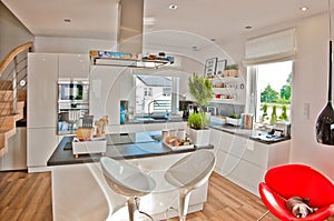 Wide angle view of modern kitchen in daylight