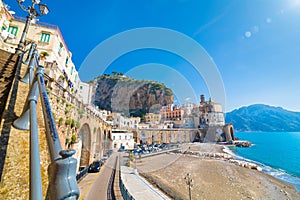 Wide angle view of road leading along coast to small town Atrani in province of Salerno, Campania region, Italy