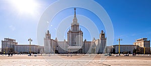 Wide angle view of spring sunny campus of Moscow University under blue sky