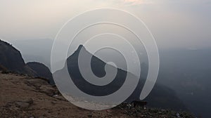 Wide angle view of a valley from the hilltop.