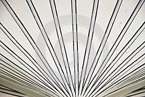 A wide-angle view of a white ceiling historic building lines pattern