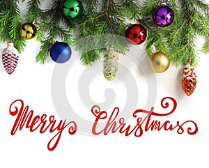 Wide Christmas border, isolated on white, consisting of fresh fir branches of fir cones and Christmas balls. Lettering.
