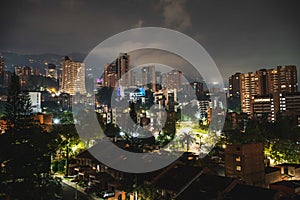 wide city capture at night of medellin, colombia in location el poblado photo