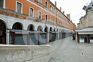 wide desert street in Venice with closed windows and closed shut