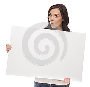 Wide Eyed Mixed Race Female Holding Blank Sign on White