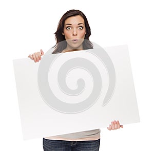 Wide Eyed Mixed Race Female Holding Blank Sign on White