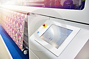 Wide format printer for on fabric and paper