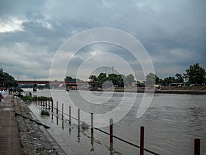 Wide ganga river view having clouds over the sky in Haridwar India. Wide ganga river of india photo