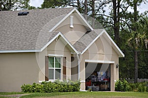 Wide garage double door and concrete driveway of new modern american house