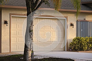 Wide garage double door and concrete driveway of new modern american house