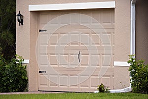 Wide garage double door and concrete driveway of new modern american house