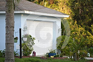 Wide garage double door and concrete driveway of new modern american house