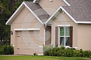 Wide garage double door and concrete driveway of new modern american house