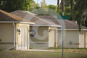 Wide garage double door and concrete driveway of new modern american house