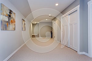 Wide hallway of home basement photo